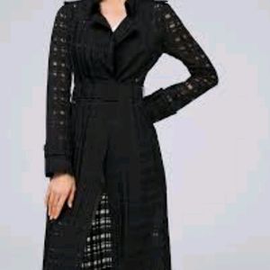 Small, black and white market trench coat.